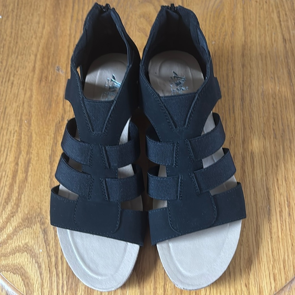 Air Flex Sandler with small wedge heel & it is black suede feel. Size 7M